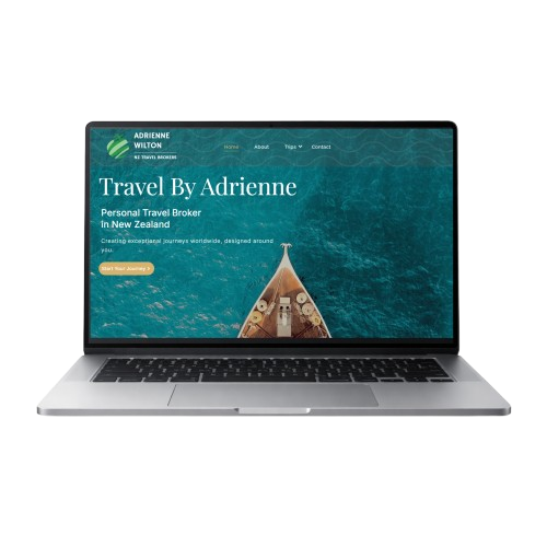 Travel By Adrienne website shown on a laptop screen